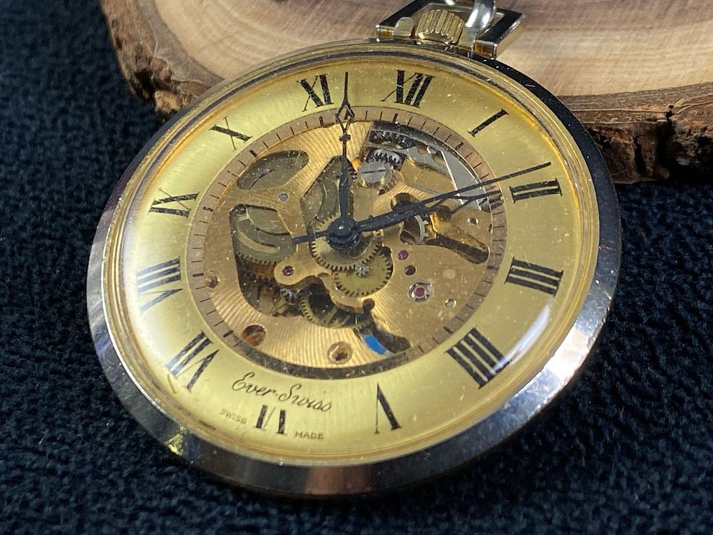 Lot 158: VINTAGE 12 SIZE SKELETONIZED EVER-SWISS POCKET WATCH WITH ROMAN DIAL