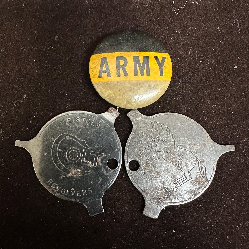 Lot 165: Colt Revolvers Ad Screwdriver Tool and Army Pinback Button