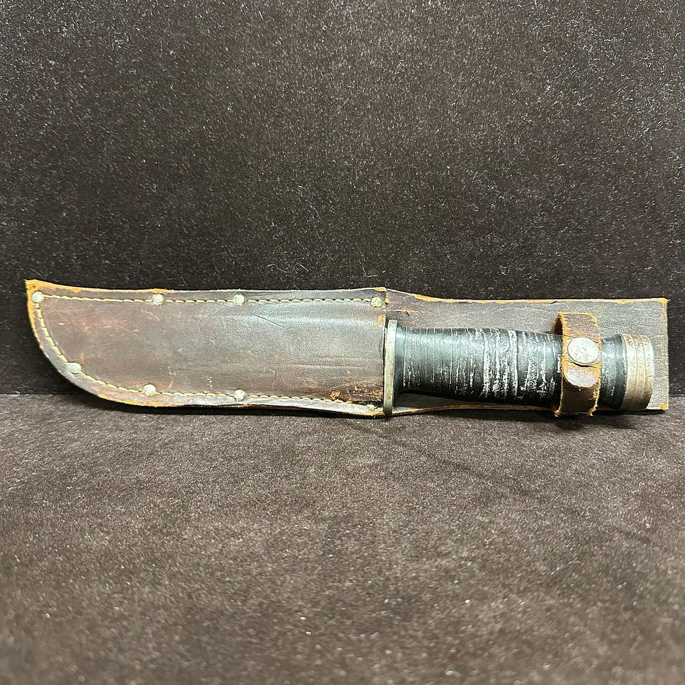 Lot 203: Cattaraugus 225Q Hunting Knife with Brown Leather Sheath