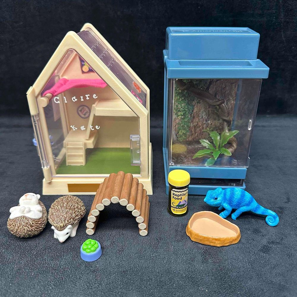 Lot 271: American Girl Mini Pet Habitat and Accessories Hedgehogs and Chameleon