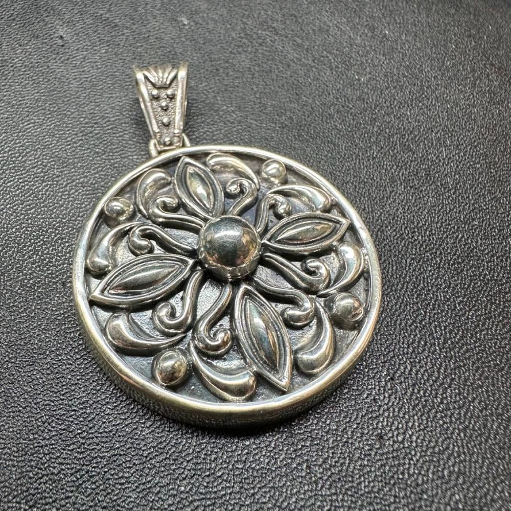 Lot 374: Round Ornate Sterling Pendant