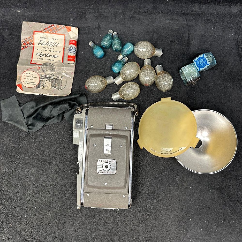 Lot 397: Polaroid Land Camera Model 80 With Flash Accessories and Case