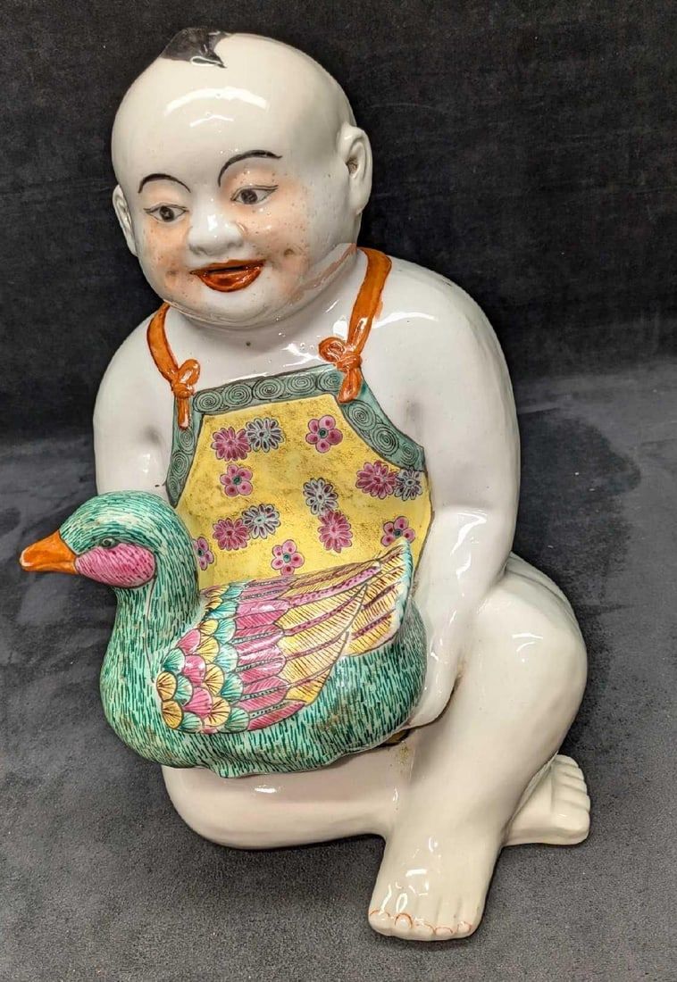 Lot 484: Chinese Famille Rose Porcelain figure Chinese Boy With A Duck R50