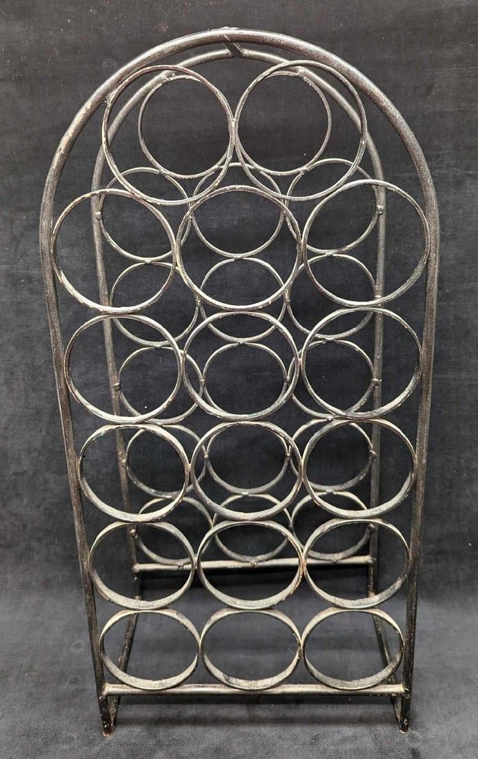 Lot 485: Arthur Umanoff Wrought Iron 17 Wine Bottle Holder