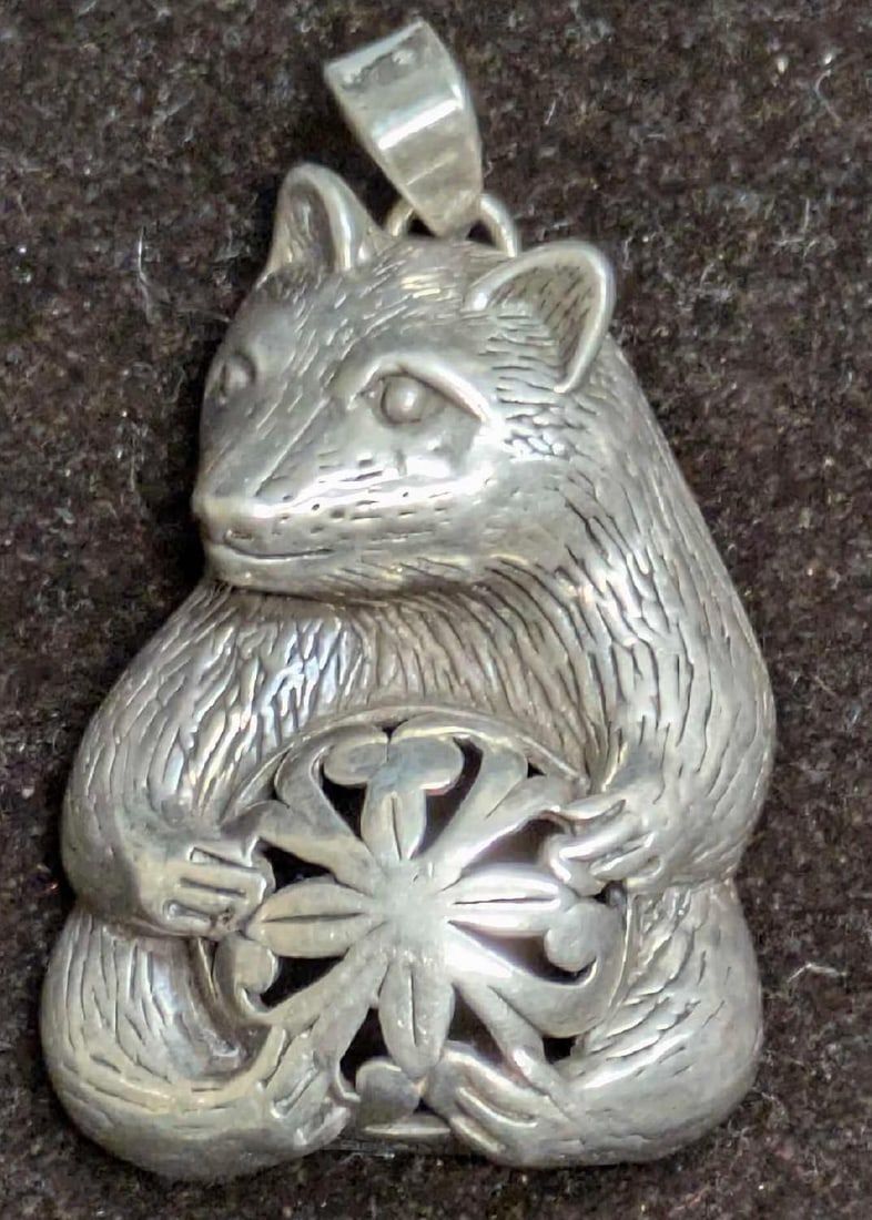 Lot 497: Vintage Jezlaine Sterling Seated Bear With Ball Pendant