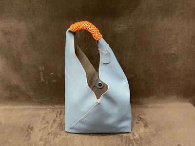 Blue Two-Tone Shoulder Tote With Wallet. Blue and brown two-tone leather-style tote bag with 