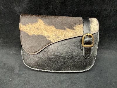Black & Brown Cowhide Buckle Handbag. Black leather and brown hair-on cowhide handbag with flap 