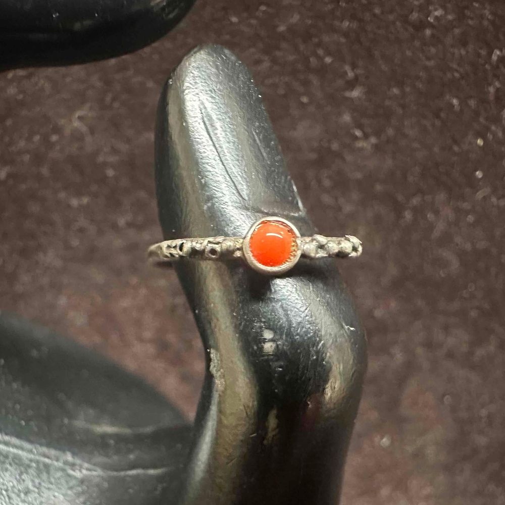 Lot 190: Sterling Silver Thin Band Red Coral Ring
