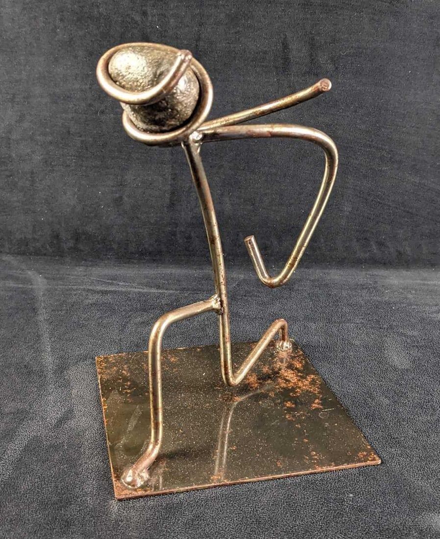 Lot 241: Hand-Made Metal Abstract Bowing Man Sculpture