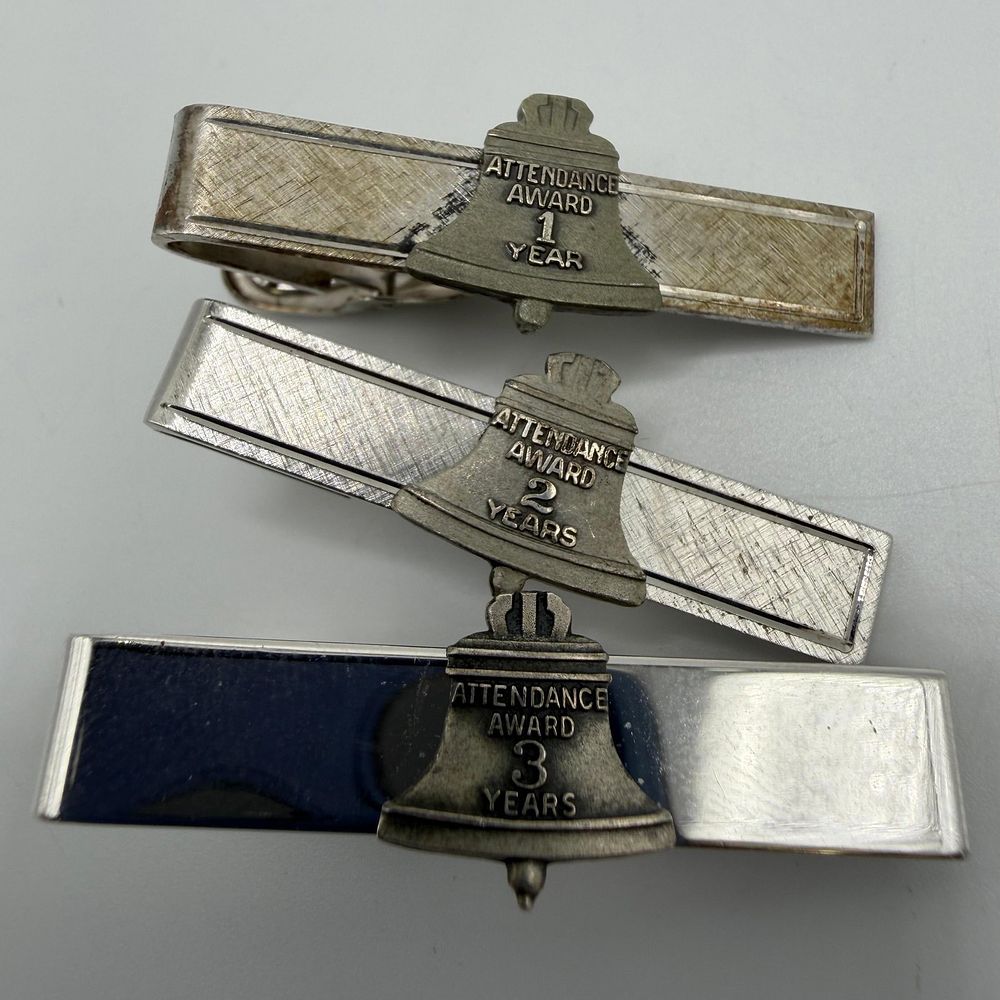 Lot 151: Sterling Silver Bell System Attendance Award Years of Service Tie Clip Set