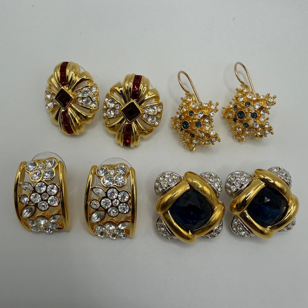 Lot 216: Rhinestone and Crystal Accent Nolan Miller Designer Earrings Four Pairs HG31