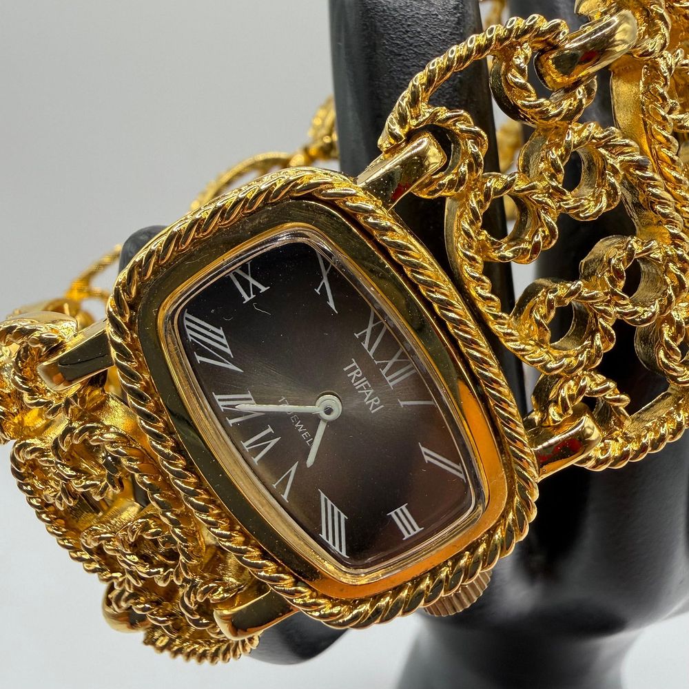 Lot 220: Trifari Gold Tone Openwork Design Chain Watch with Box