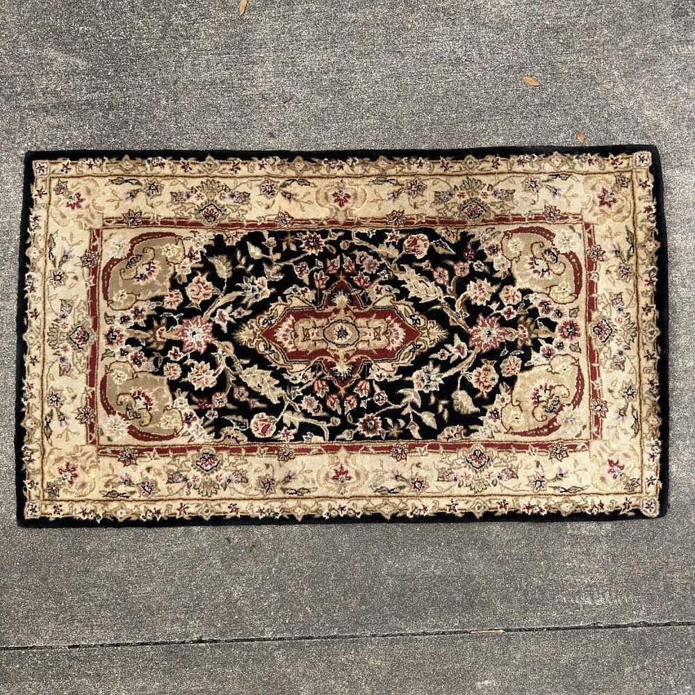 Lot 450: Black Nourison 2000 New Zealand Wool Floral Accent Rug Stained