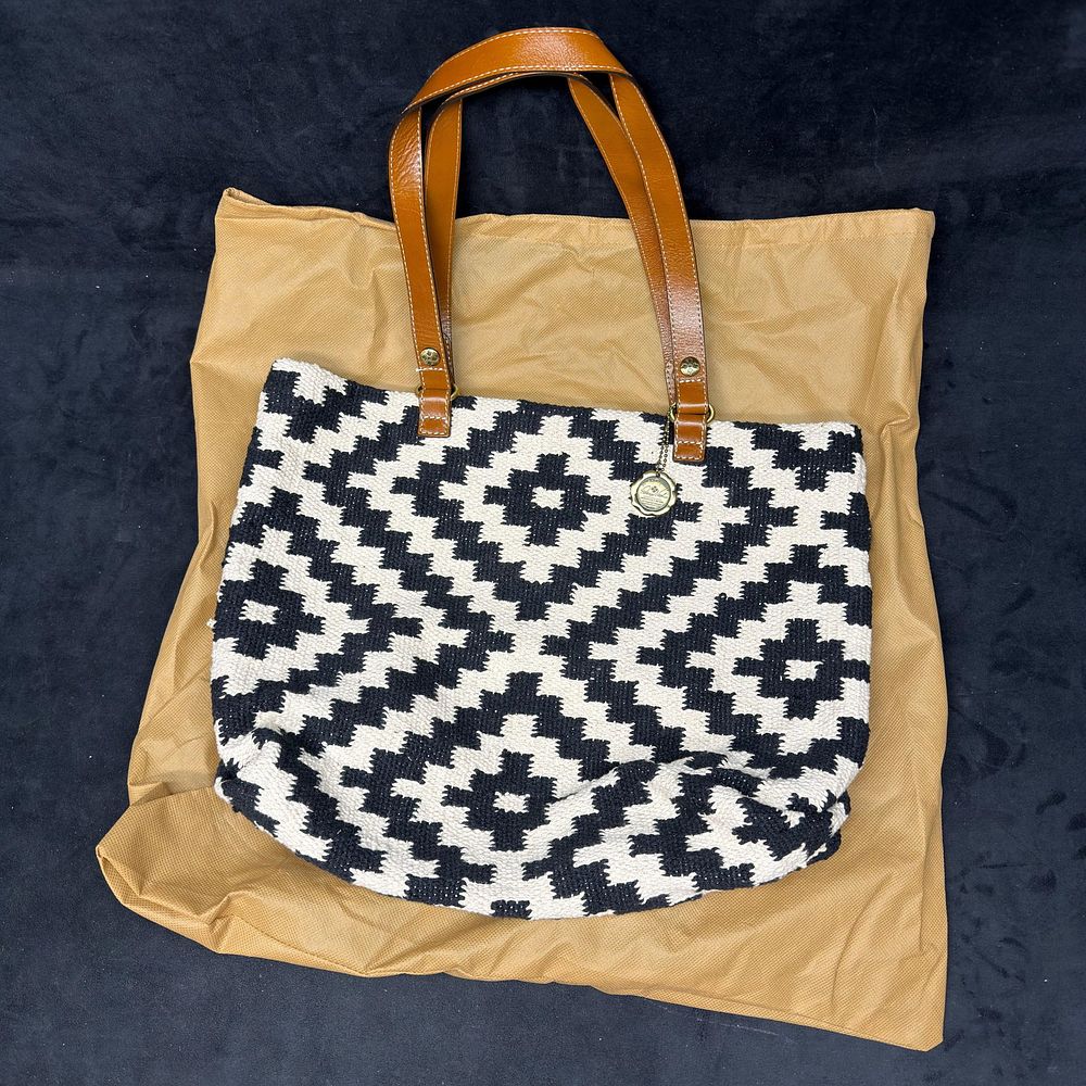 Lot 463: Patricia Nash Black and White Woven Tote Handbag with Leather Handles