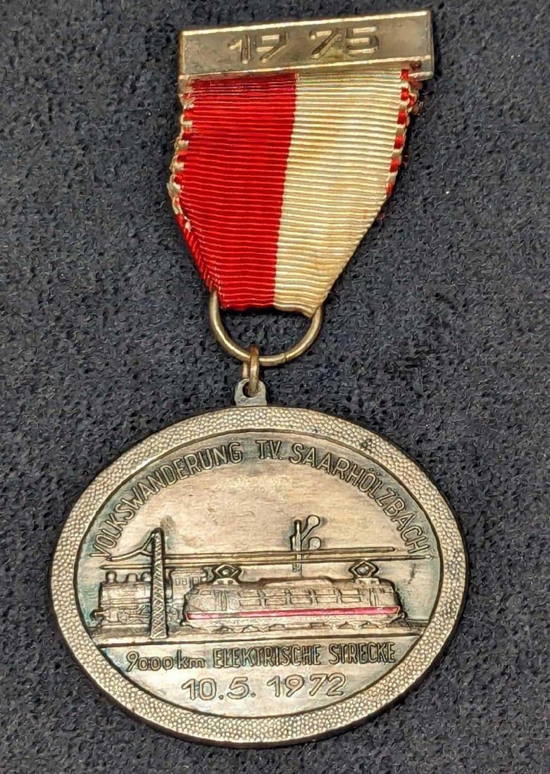 Lot 266: 1975 Volkswanderung T.V. Saarholzbach Race Medal