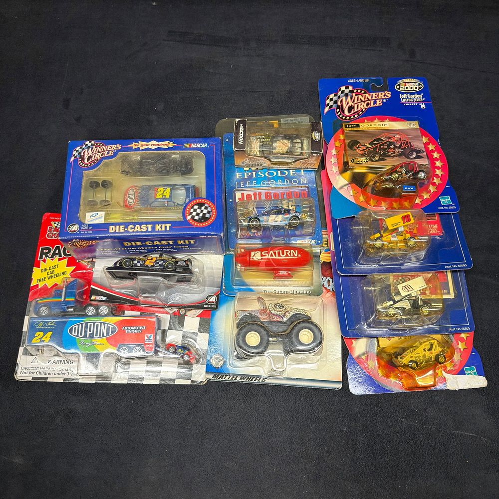 Lot 418: Assorted NASCAR Winners Circle and Racing Die-Cast Collectibles Saturn Vue