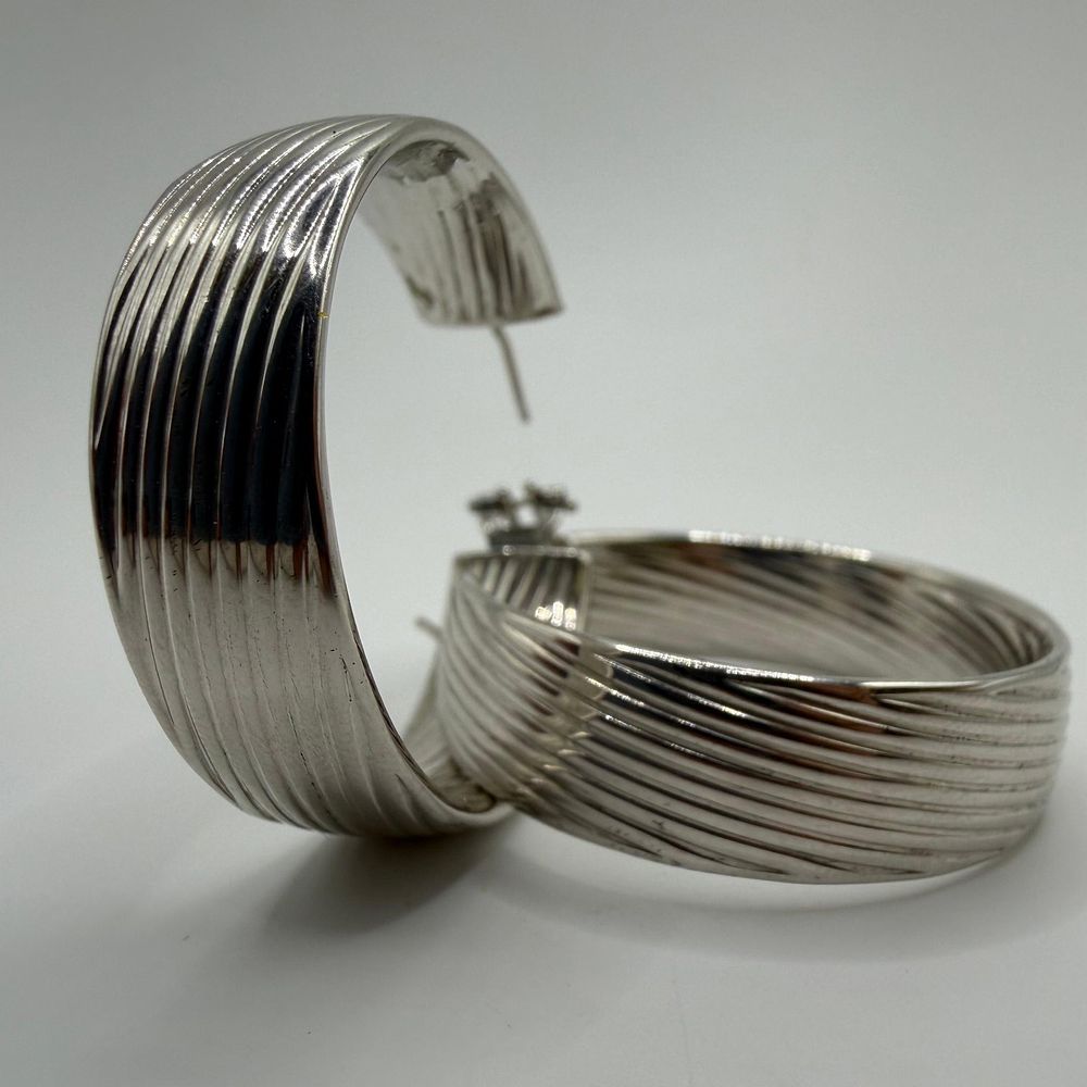 Lot 442: Bronze Milor Polished Silver Tone Hoop Ribbed Earrings