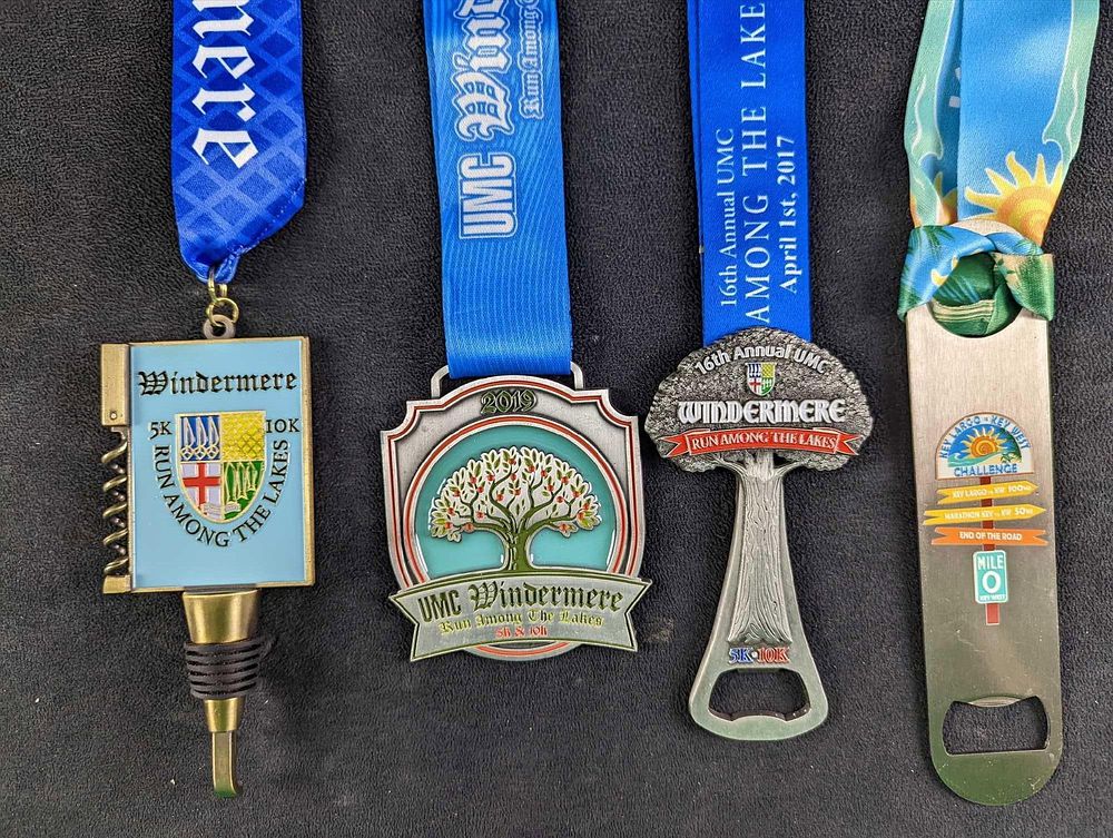 Lot 490: JB Four Windermere Key West Marathon Medals