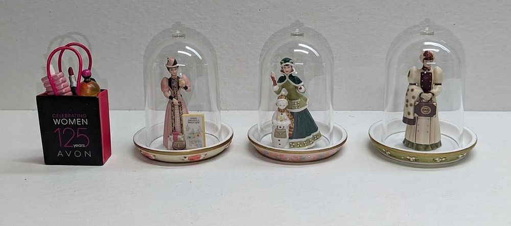 Lot 378: 4 Retired AVON Minature Bag & Ladies Figurines