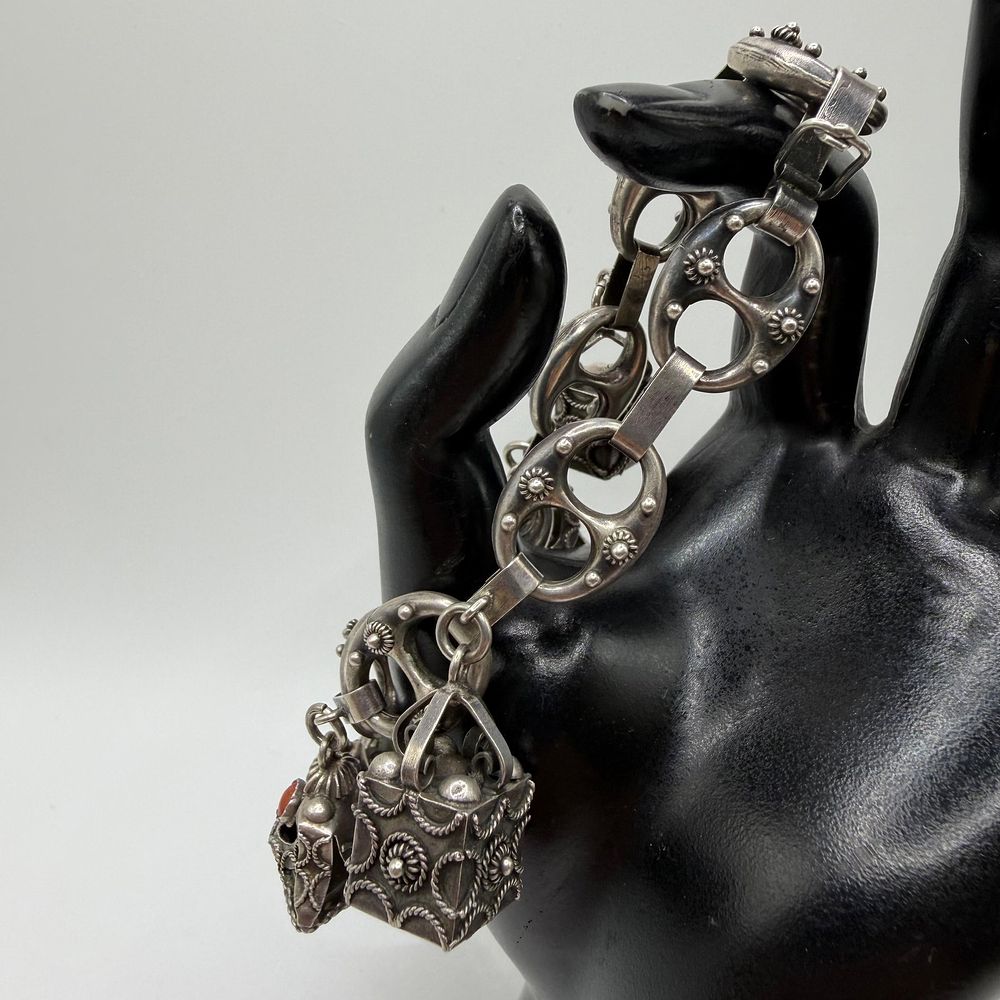 Lot 469: S and F Etruscan Revival Style Sterling Silver Charm Stone Accents Bracelet ER60