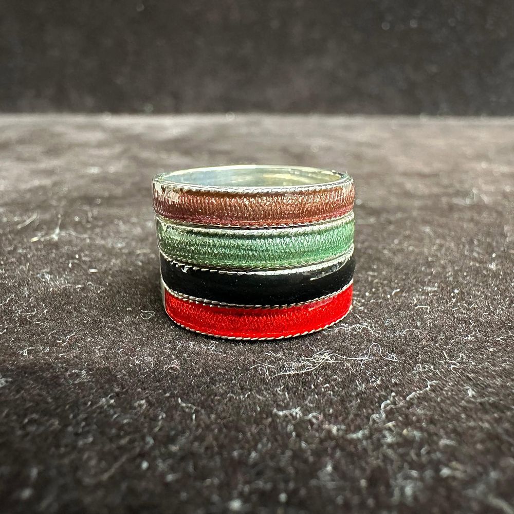 Lot 313: Multi Color Enamel Sterling Silver Stacking Ring Set L54