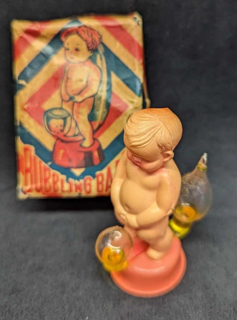 Lot 443: Vintage Bubbling Baby Novelty Toy