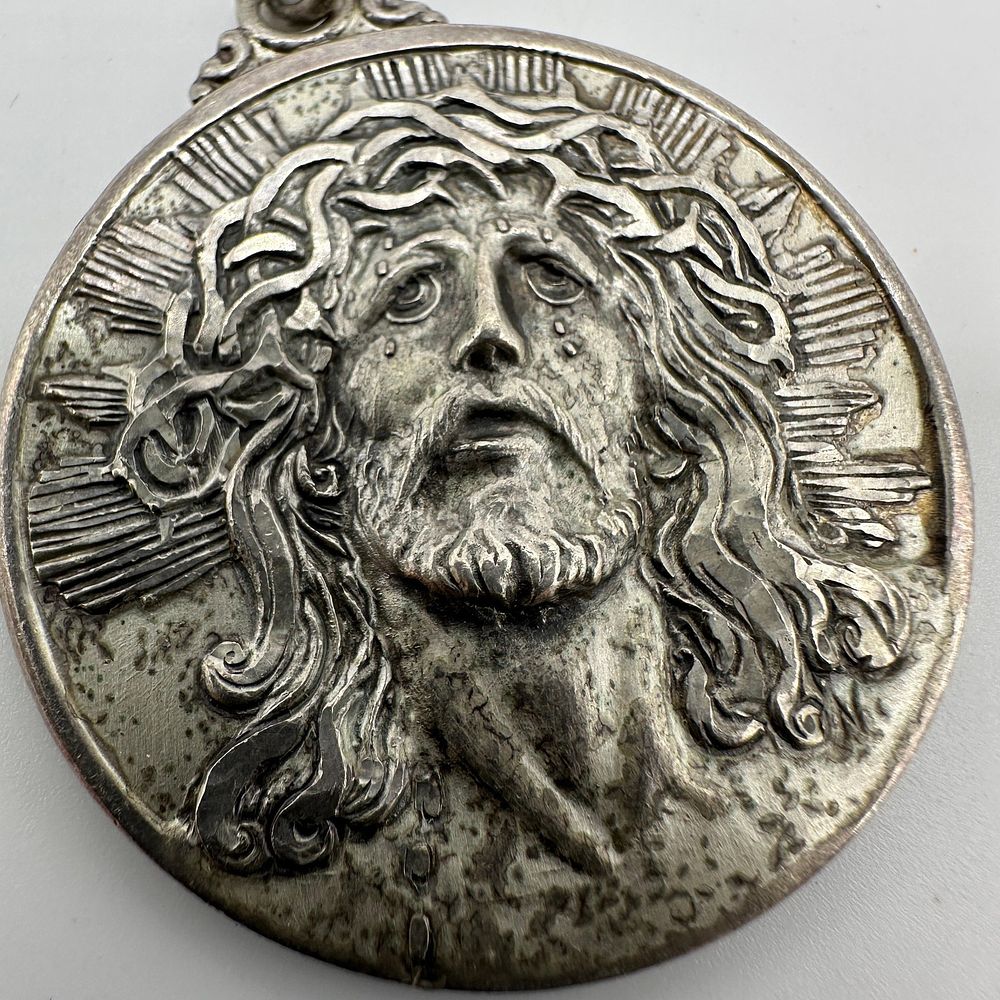 Lot 202: Sterling Silver Creed Jesus Suffering Pendant Radiating Halo Design