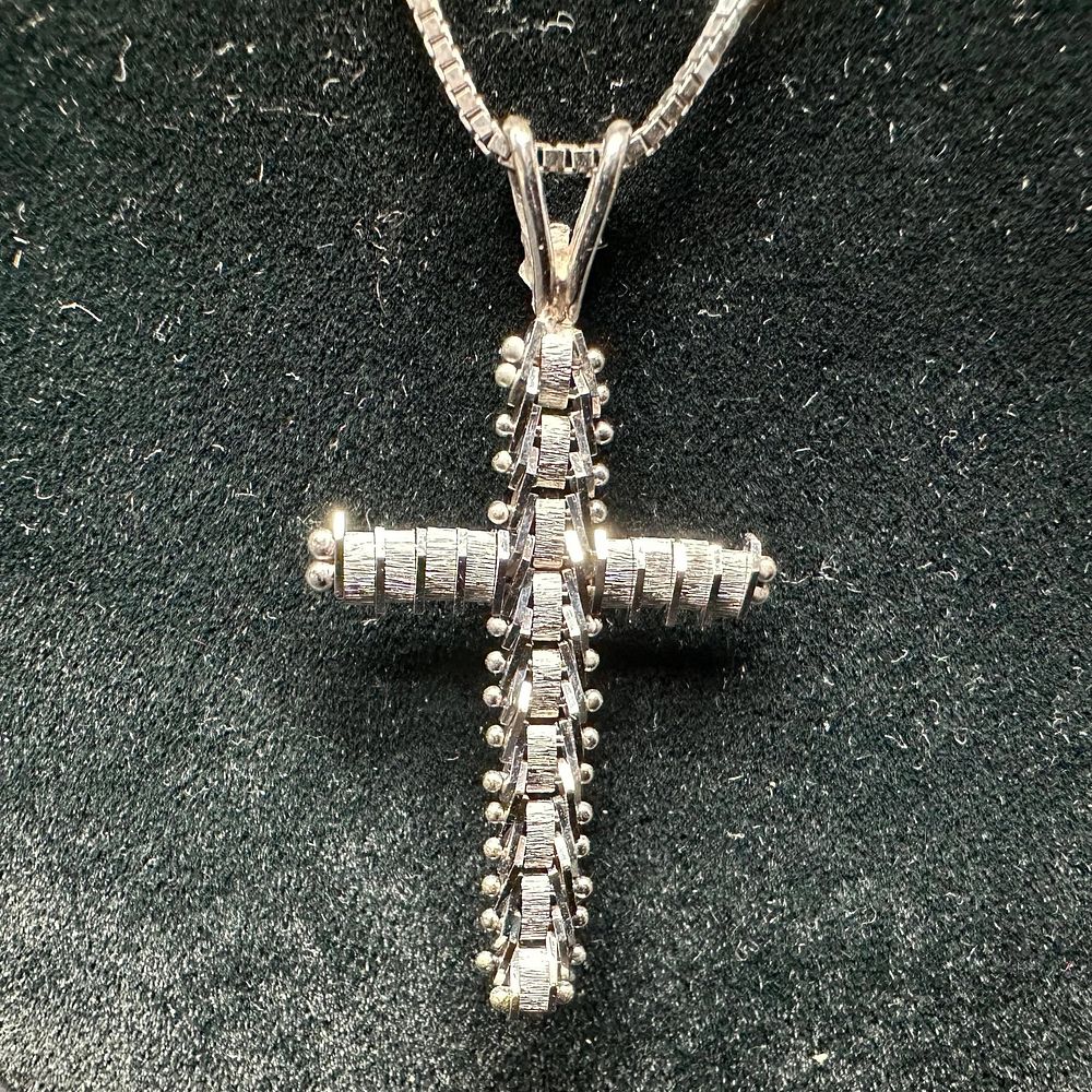 Lot 232: Articulating Bendable Cross 14K Gold White Necklace
