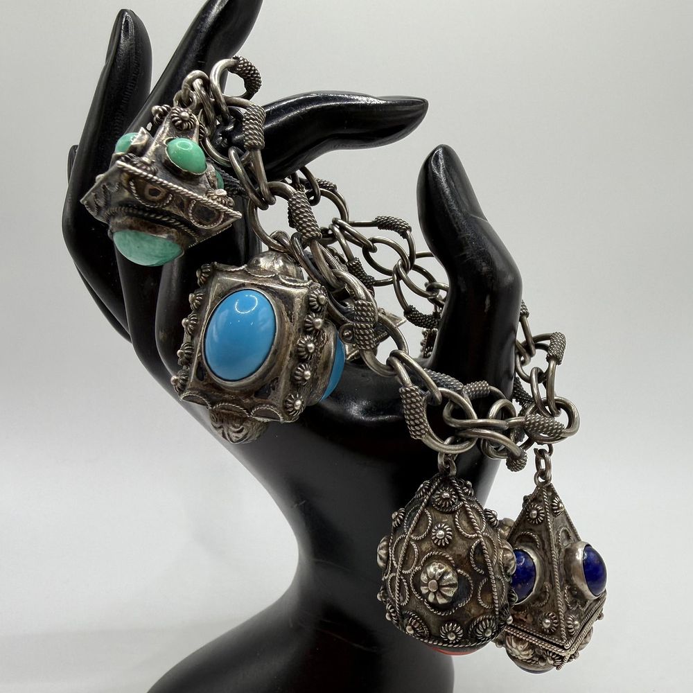 Lot 448: 800 Silver Charms with Silverwork Style Bracelet RS11
