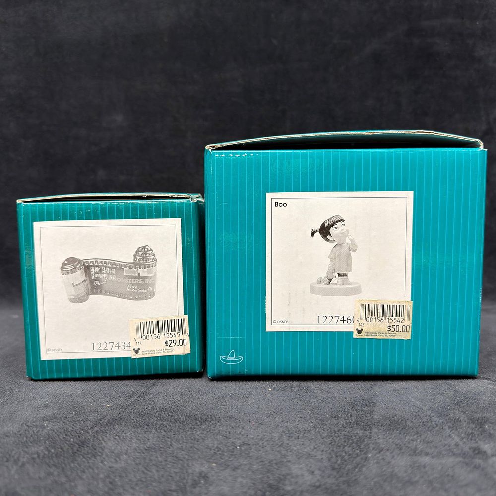 Lot 454: Walt Disney Classics Collection Monsters Inc Boo Figurine and Opening Title Film Strip WDCC