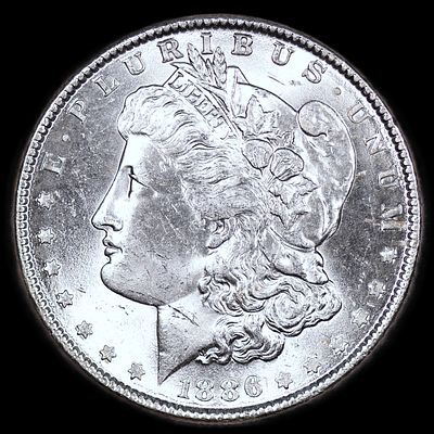 1886 Morgan Silver Dollar BU+. BU from recently opened roll
