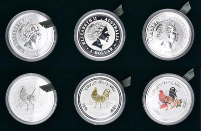 Австралия. Набор из трех монет 1 доллар 2005 года. Серия "Лунный календарь". Год петуха. Серебро 
