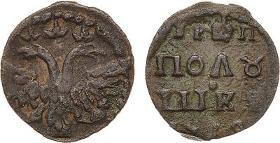 Полушка 1719 года. Медь. 0,89г. Кадашевский монетный двор. Аверс: короны с тремя зубцами, узкий 