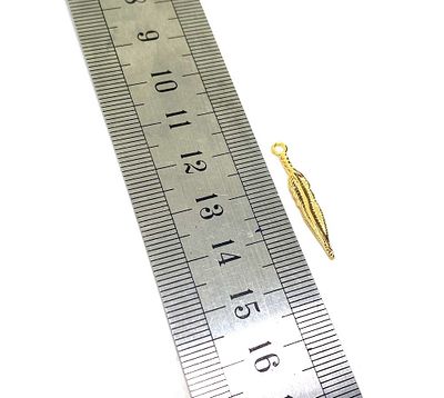 7 long leaf pendants 14k gold plated. 4.5 mm 27 mm