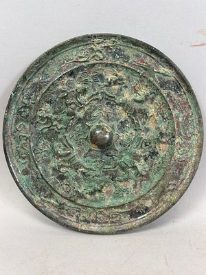 Antique Chinese Bronze Mirror. Chinese Bronze Mirror. 0.25"h x 7"w x 7"l Condition: Fair vintage