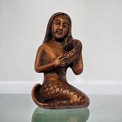 Early Signed Hand Carved Japanese Boxwood Netsuke Of A Mermaid Combing Her Hair. Measures 