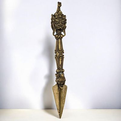Antique Tibetan Bronze Phurba Four-Faced Figural Phurba Dagger. Measures approx. 9" long. From 