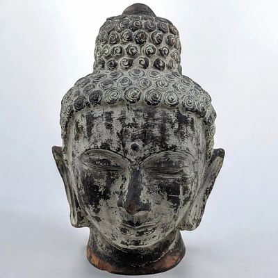 Large Old Terracotta Oriental Buddha Head. Measures approx. 21" X 12". From the consignor: My 