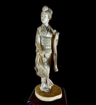 Magnificent Meiji Era Okimono Of A Maiden With Pruning Scissors, Signed 1880. Signed on bottom.