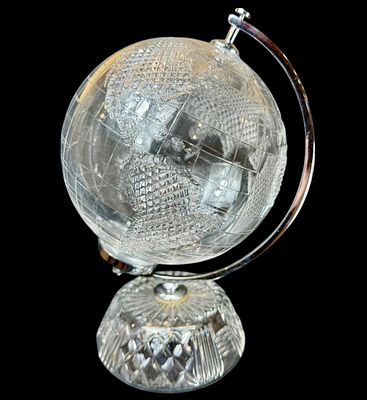 A Fine Waterford Cut Crystal World Globe. Waterford cut glass crystal globe. Measure 12" tall