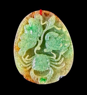 A Very Fine Carved Chinese Jadeite Pebble. Chinese carved jadeite pebble depicting a crab