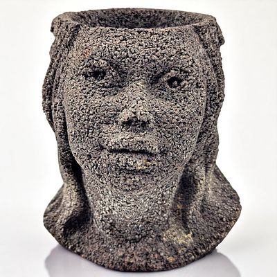 Mid-Century Hawaiian Volcanic Rock / Pumice Female Bust Pot. Measures approx. 5 1/2" X 5". 