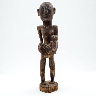 African Hand Carved Wooden Maternity Sculpture. Measures approximately 19-1/2" x 4" 
Please 