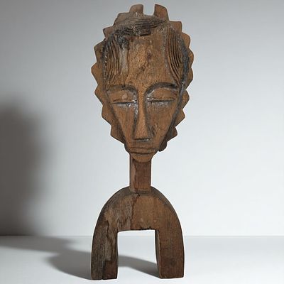 Hand Carved Traditional African Heddle Pulley. Measures approx. 12.5" x 5" X 2.75". 
Please 
