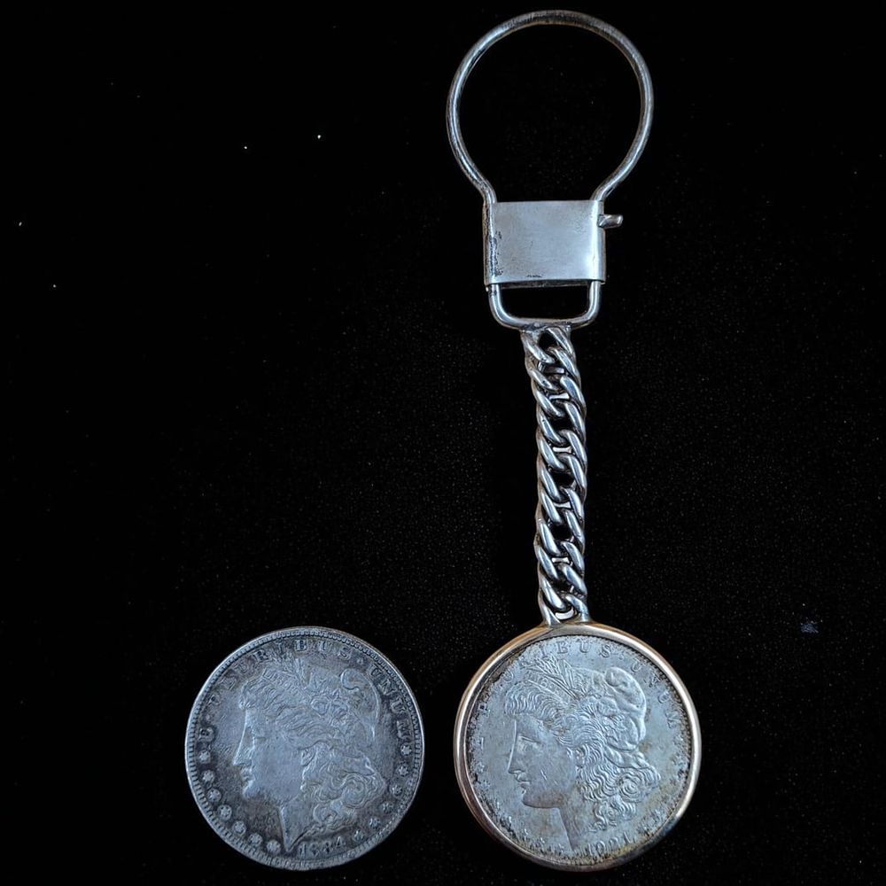 1884 And 1921 Morgan Silver Dollars. **THIS LOT CAN NOT BE SHIPPED TO MEXICO OR CHINA** 
1884 