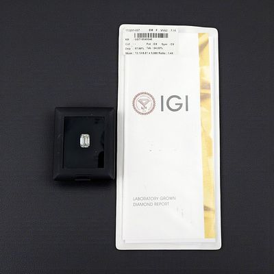 A Brilliant 7.16 CT Emerald Cut F VVS2 LAB GROWN Diamond In A Display Case With IGI Certificate. 