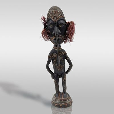 A Finely Carved Wooden Papua New Guinean Male Ancestral Standing Figure. Measures approx. 15" 