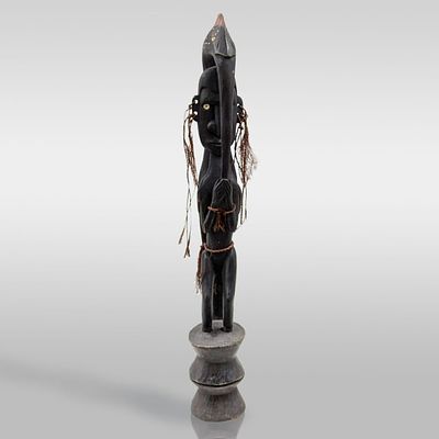 A Finely Carved Wooden Papua New Guinean Tribal Standing Figure. Please note that one of the 