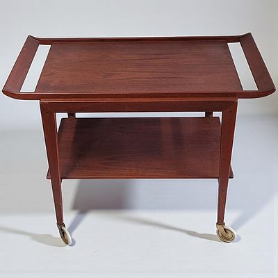 Mid Century Teak Two Tier Danish Trolley. Measures approx. 27.5" X 35" X 19". 
Please copy and 