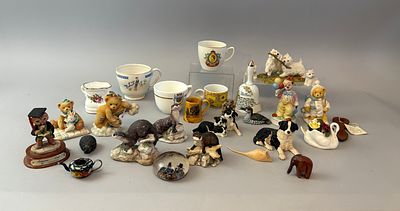 A Large Collection of Decorative Ceramic and Resin Figurines and Collectibles. A collection of 